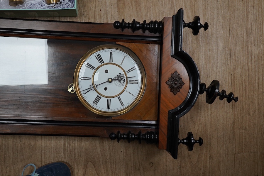 A walnut cased Vienna regulator with two train movement, striking on a coiled gong, 125cm high. Condition - fair to good.